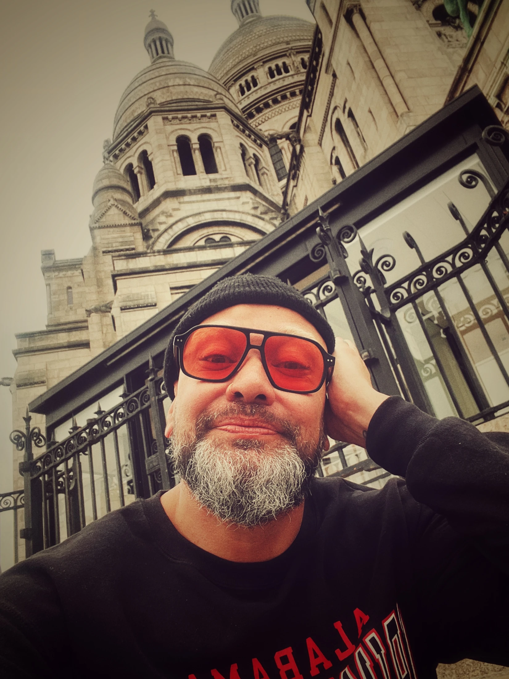 Brendon Coster wearing red sunglasses